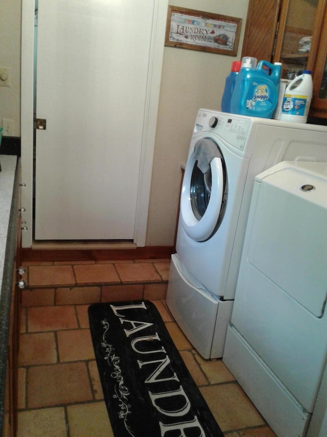 701 Spears Ave, Crane, MO 65633 - washroom featuring washing machine and clothes dryer