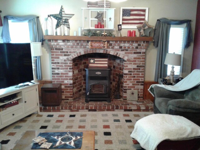 701 Spears Ave, Crane, MO 65633 - living room with a wood stove and plenty of natural light
