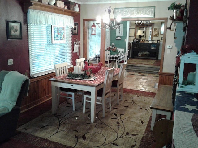 701 Spears Ave, Crane, MO 65633 - dining space featuring a chandelier and crown molding