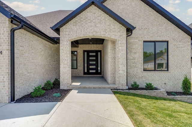 2124 N Silver Charm Ave, Springfield, MO 65802 - property entrance with brick siding