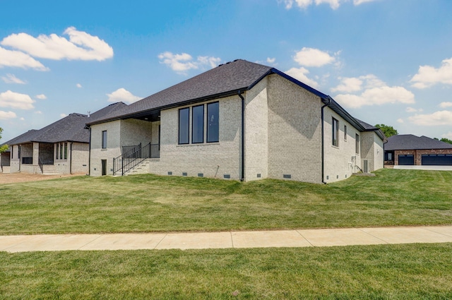 2124 N Silver Charm Ave, Springfield, MO 65802 - view of front of home with brick siding, a front lawn, and crawl space
