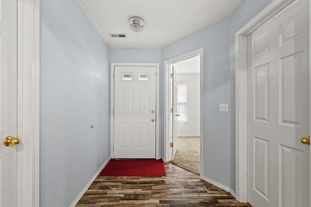 280 Quail Run Rd, Branson, MO 65616 - entryway featuring dark wood finished floors and baseboards