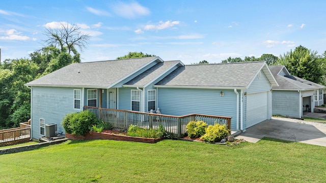 280 Quail Run Rd, Branson, MO 65616 - view of home's exterior with an attached garage, concrete driveway, roof with shingles, and a lawn
