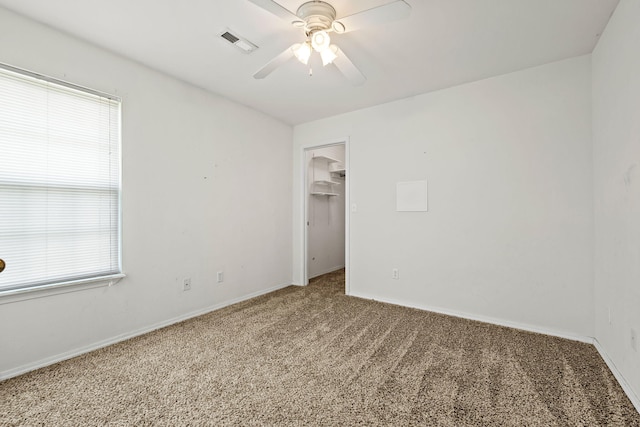 280 Quail Run Rd, Branson, MO 65616 - carpeted empty room featuring a ceiling fan and plenty of natural light