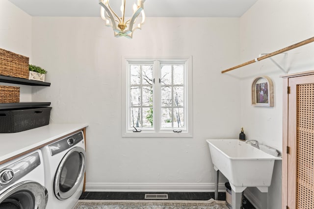 6420 E Turner Springs Rd, Springfield, MO 65809 - washroom featuring separate washer and dryer and a chandelier