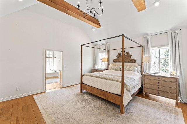 6420 E Turner Springs Rd, Springfield, MO 65809 - bedroom with multiple windows, beam ceiling, wood-type flooring, a chandelier, and high vaulted ceiling