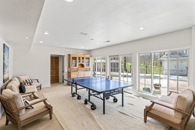 6420 E Turner Springs Rd, Springfield, MO 65809 - game room featuring a textured ceiling, light colored carpet, and recessed lighting