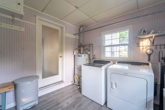 600 E Boone St, Ash Grove, MO 65604 - laundry area featuring gas water heater, washer and clothes dryer, and light wood finished floors
