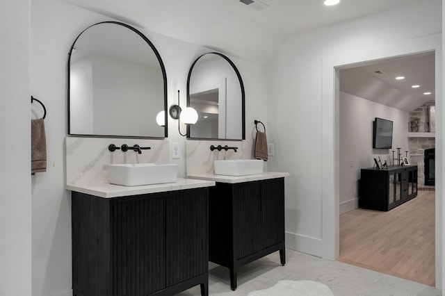 12451 State Highway 174, Billings, MO 65610 - bathroom featuring vaulted ceiling, vanity, and recessed lighting
