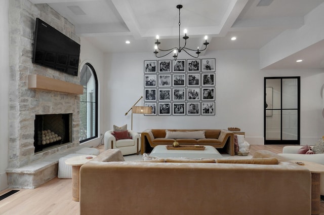 12451 State Highway 174, Billings, MO 65610 - living area with light wood-type flooring, a stone fireplace, beamed ceiling, recessed lighting, and coffered ceiling