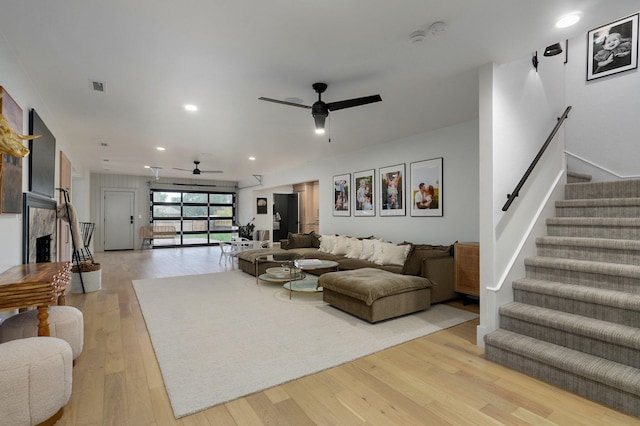 12451 State Highway 174, Billings, MO 65610 - living area featuring a ceiling fan, stairs, light wood finished floors, recessed lighting, and a fireplace
