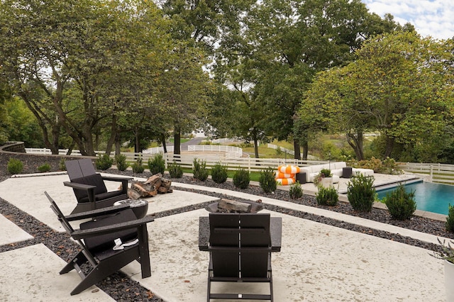 12451 State Highway 174, Billings, MO 65610 - view of community featuring a patio area, a swimming pool, and view of wooded area
