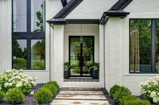 12451 State Highway 174, Billings, MO 65610 - view of exterior entry with brick siding and french doors