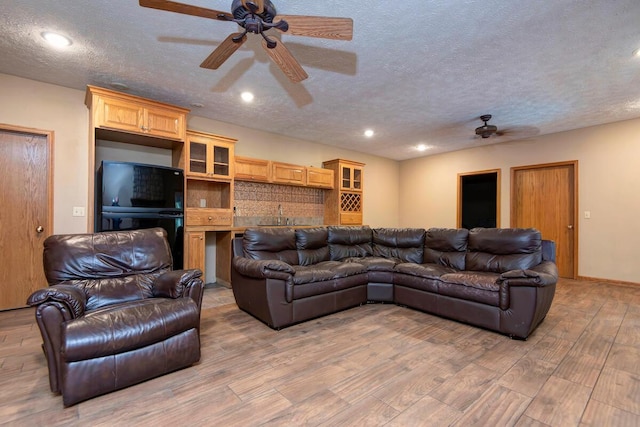 1108 N 18th Ave, Ozark, MO 65721 - living area with a ceiling fan, a textured ceiling, light wood-type flooring, and recessed lighting