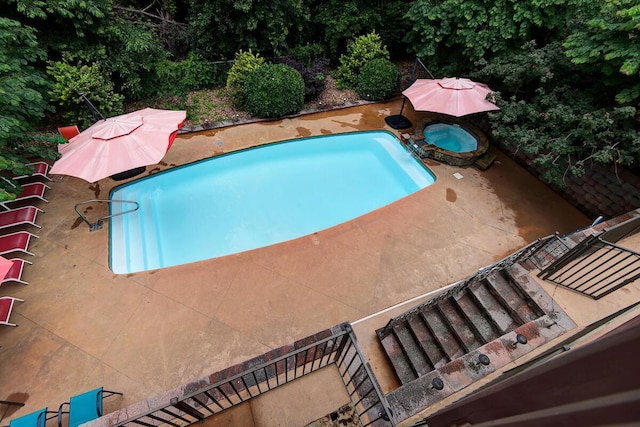 1108 N 18th Ave, Ozark, MO 65721 - view of swimming pool with a patio and a pool with connected hot tub