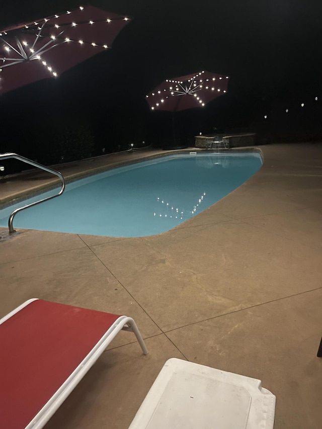 1108 N 18th Ave, Ozark, MO 65721 - pool at night with an outdoor pool