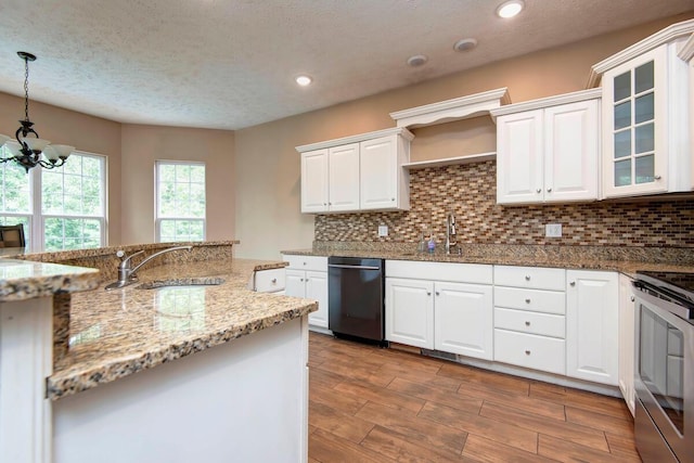 1108 N 18th Ave, Ozark, MO 65721 - kitchen with dishwasher, stainless steel range with electric cooktop, decorative backsplash, white cabinetry, and a textured ceiling