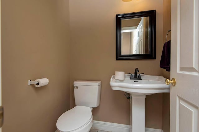 1108 N 18th Ave, Ozark, MO 65721 - bathroom featuring toilet and baseboards