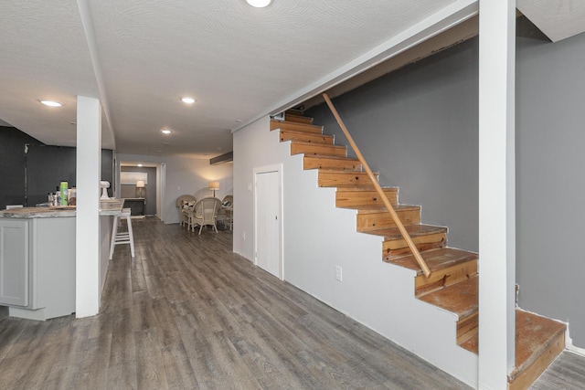 2225 N Plainview Ave, Springfield, MO 65803 - stairs featuring wood finished floors and recessed lighting