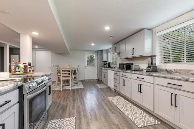 2225 N Plainview Ave, Springfield, MO 65803 - kitchen with electric range, dark wood-type flooring, dishwasher, recessed lighting, and black microwave