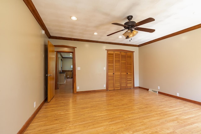2225 N Plainview Ave, Springfield, MO 65803 - unfurnished bedroom with light wood finished floors, ornamental molding, recessed lighting, a closet, and ceiling fan