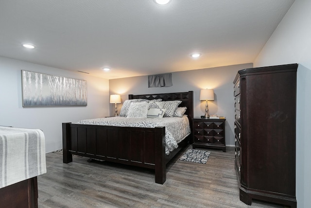 2225 N Plainview Ave, Springfield, MO 65803 - bedroom with wood finished floors and recessed lighting