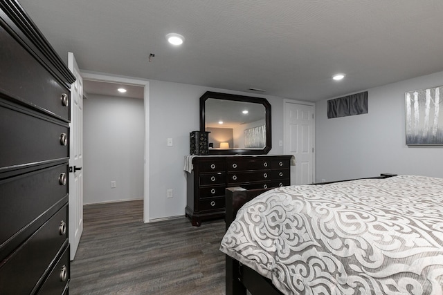 2225 N Plainview Ave, Springfield, MO 65803 - bedroom featuring dark wood-type flooring and recessed lighting