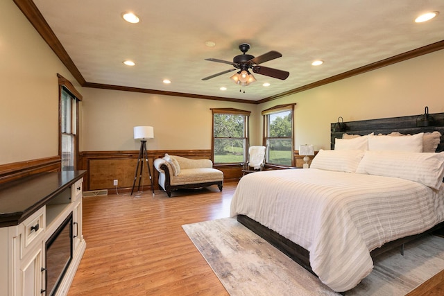 2225 N Plainview Ave, Springfield, MO 65803 - bedroom with wainscoting, light wood-type flooring, recessed lighting, crown molding, and a ceiling fan