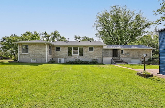 2225 N Plainview Ave, Springfield, MO 65803 - rear view of house featuring a lawn and stone siding