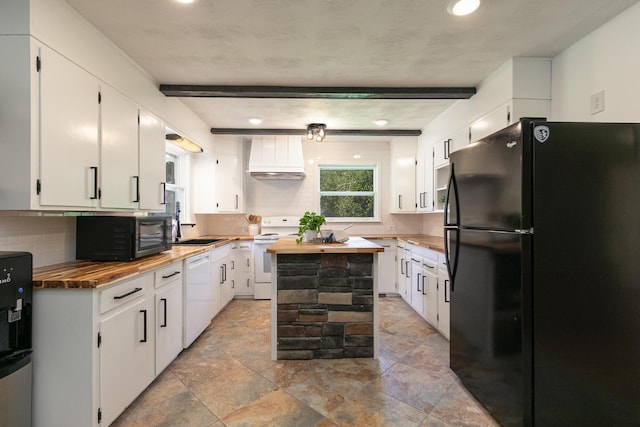2225 N Plainview Ave, Springfield, MO 65803 - kitchen with black appliances, butcher block counters, custom range hood, tasteful backsplash, and light stone finish flooring