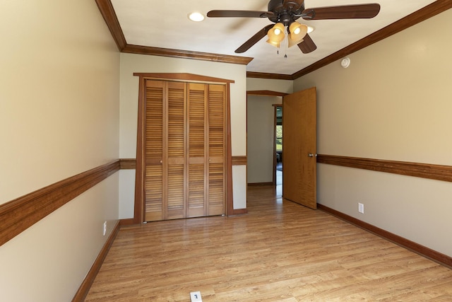 2225 N Plainview Ave, Springfield, MO 65803 - unfurnished bedroom with ornamental molding, light wood finished floors, a closet, recessed lighting, and a ceiling fan
