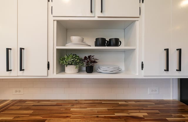 2225 N Plainview Ave, Springfield, MO 65803 - detailed view of open shelves, white cabinets, and backsplash