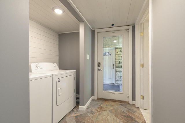 2225 N Plainview Ave, Springfield, MO 65803 - laundry room featuring independent washer and dryer, light stone finish flooring, wooden ceiling, wooden walls, and ornamental molding