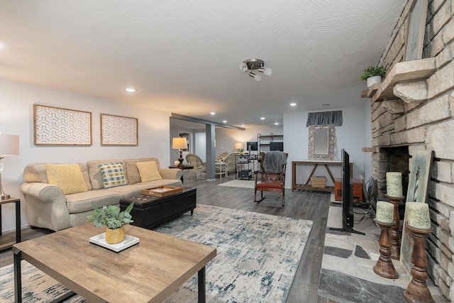 2225 N Plainview Ave, Springfield, MO 65803 - living room with wood finished floors, recessed lighting, and a fireplace