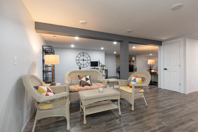 2225 N Plainview Ave, Springfield, MO 65803 - living room with dark wood finished floors, recessed lighting, and a fireplace