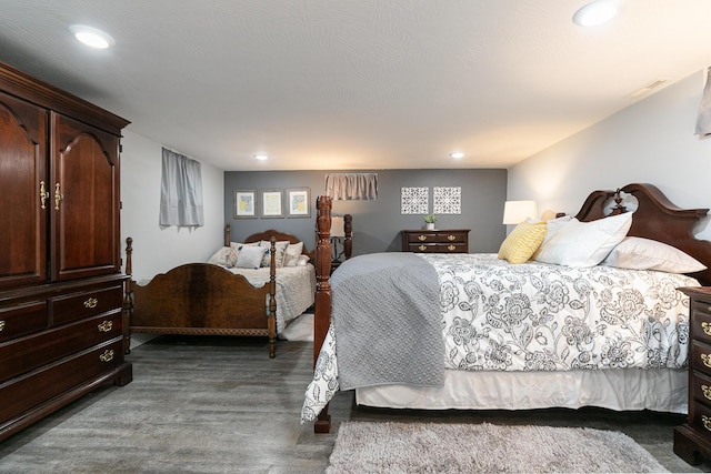 2225 N Plainview Ave, Springfield, MO 65803 - bedroom featuring recessed lighting and dark wood-type flooring