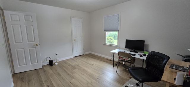 2782 W Swan St, Springfield, MO 65807 - office area featuring wood finished floors and baseboards