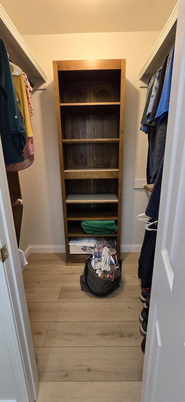 2782 W Swan St, Springfield, MO 65807 - walk in closet featuring wood finished floors