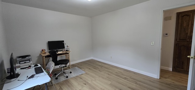 2782 W Swan St, Springfield, MO 65807 - home office with light wood-style flooring and baseboards