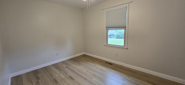 2782 W Swan St, Springfield, MO 65807 - spare room featuring wood finished floors and a ceiling fan