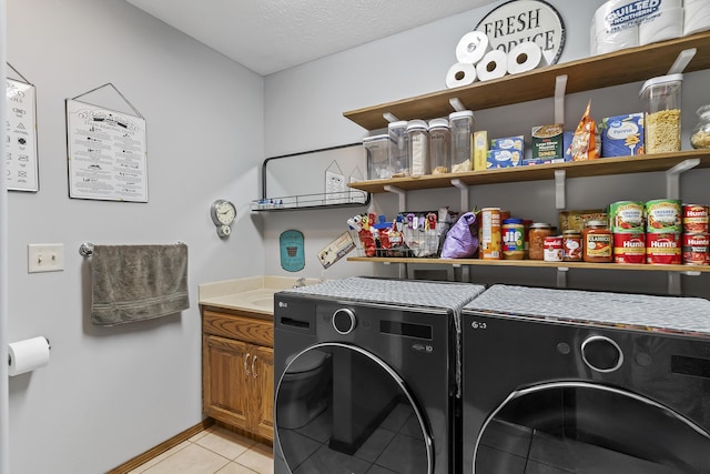 11996 N Farm Rd Unit 119, Brighton, MO 65617 - laundry room with washer and dryer, light tile patterned floors, and a textured ceiling