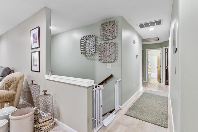11996 N Farm Rd Unit 119, Brighton, MO 65617 - hall with wood finished floors and baseboards