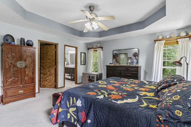 11996 N Farm Rd Unit 119, Brighton, MO 65617 - bedroom featuring carpet floors, multiple windows, a ceiling fan, and ensuite bathroom