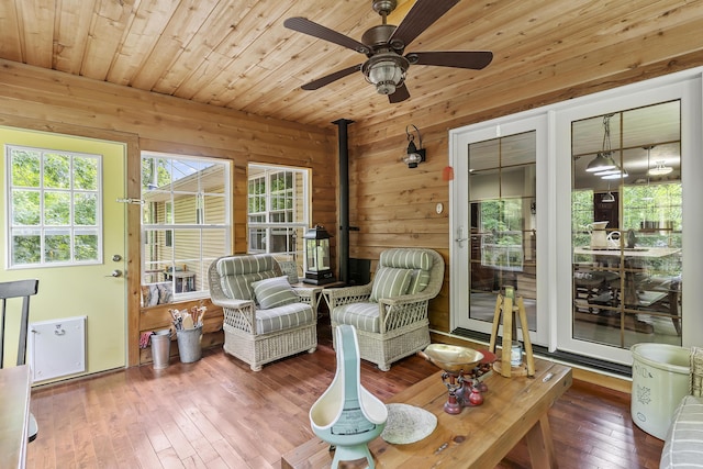 11996 N Farm Rd Unit 119, Brighton, MO 65617 - sunroom featuring a wood stove