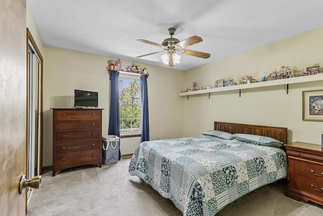 11996 N Farm Rd Unit 119, Brighton, MO 65617 - bedroom with light colored carpet, a closet, and ceiling fan