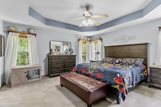 11996 N Farm Rd Unit 119, Brighton, MO 65617 - bedroom featuring light colored carpet, a tray ceiling, and ceiling fan