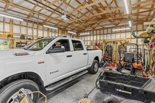 11996 N Farm Rd Unit 119, Brighton, MO 65617 - garage with a garage door opener and metal wall