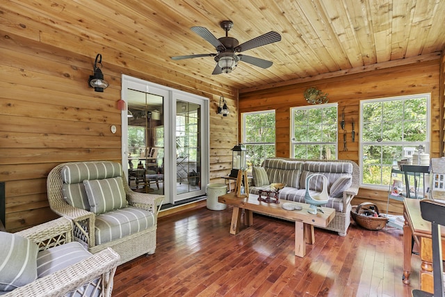 11996 N Farm Rd Unit 119, Brighton, MO 65617 - living room featuring wood ceiling, hardwood / wood-style floors, ceiling fan, and wood walls