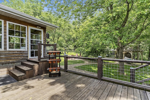 11996 N Farm Rd Unit 119, Brighton, MO 65617 - deck featuring view of wooded area and a lawn