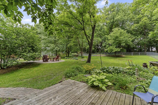 11996 N Farm Rd Unit 119, Brighton, MO 65617 - wooden terrace with view of wooded area